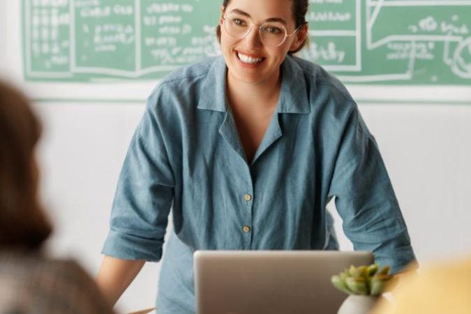 happy-kids-and-teacher-at-school-2024-11-05-07-38-45-utc